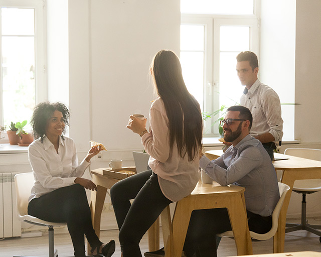 Manchester Web Design Agency strategy discussion by 22 Group employees